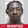 One of two wanted men located