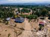 Indonesia flood deaths pass 1,000 as aid work speeds up