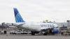 United Airlines flight with 275 passengers lands after engine failure, fire near airport