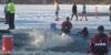 Alaskans brave the cold, wind to plunge into Goose Lake for Special Olympics Alaska