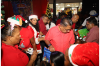 Mustapha leads Christmas tree light-up and toy distribution in New Amsterdam