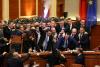 Albanian parliament in chaos as politicians fight each other and set off flares