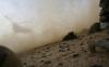From the archives: A CH-47 Chinook helicopter kicks up dust and rocks in Afghanistan, 2010