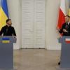Poland's President Karol Nawrocki (R) and Ukraine's President Volodymyr Zelensky at a joint press conference in Warsaw