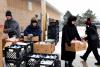 Long lines at the food pantry: Inflation tests Trump’s base in Michigan as Senate race looms