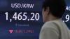 Won strengthens past 1,450 after rare FX warning