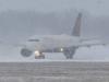US air travel disrupted as winter storm hits Northeast