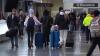 Winter storm slows holiday travel at Mass. airport