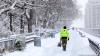 Snow storm blankets New York City, disrupting holiday travel