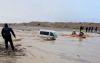 Parents and child rescued from van caught up in flood in south, as rains lash Israel