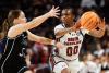 Tessa Johnson and Madina Okot score 18 points each as No. 3 South Carolina beats Providence 96-55