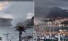 Terrifying moment waterspout rips through harbour in Spanish holiday resort as floods leave at least one dead and others missing
