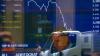 Australian shares slip slightly as mining and gold stocks drag