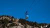 Two injured and more than 100 stranded as cable car slams into barrier at 9,000ft summit in Italy