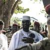 Guinea junta chief and presidential candidate Mamady Doumbouya (CR) seized power four years ago