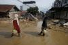 Dead chickens and molotov cocktails sent to critics of Indonesia’s flood response