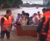 Race to get aid to Asia flood survivors as death toll tops 1,300