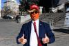 Small Denver Protest Mocks Trump on Anniversary of January 6 Insurrection