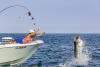 Closet design firm exec catches big wins while fishing