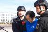 China extradites accused scam boss from Cambodia