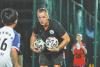 French coach kicks the ball in for Sanya youth soccer
