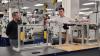 UW-Stout engineering students design pallet stacker for Ashley Furniture