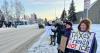 Dozens of Anchorage residents stand with Minnesota against ICE at protest