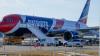 Take a look: Patriots board plane for Denver Saturday at T.F. Green
