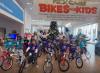 Rick Case Bikes for Kids Makes Holidays “Wheely” Bright  Rick Case Automotive Group distributed gently used bicycles donated by the community.