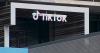 TikTok knuckles and settles lawsuit aginst social media giants