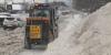 State sidewalk plowing underway in Anchorage, will take time
