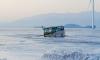 Ice-sealed, abandoned bus turns reservoir into new social media sensation in Beijing