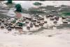 Year’s rain in 10 days: climate change blamed for deadly floods