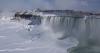 Partially frozen Niagara Falls attracts tourists in below freezing temperatures