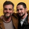 Brazilian actors Wagner Moura (L) and Gabriel Leone (R) pose for a photo at the gala premiere of the film "O Agente Secreto" (The Secret Agent) during the 27th Rio Film Festival at Cinema Odeon in Rio de Janeiro, Brazil on October 7, 2025