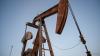 Oil pauses as investors eye US-Iran talks