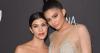 Kylie Jenner & Kourtney Kardashian Hold Hands As They Arrive at Cosmetics Launch