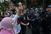 Australia urges calm after violent clashes in Sydney over Herzog visit