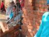 During reconstruction of an ancient temple, Muslim women attempt to demolish a wall !