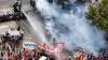 Argentinian security forces fire water cannon and tear gas at protesters