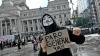 A demonstrator calls for a general strike in Argentina in response to President Javier Milei's labour reform bill.