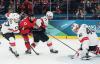 Olympics-Ice hockey-Canada ease past Swiss, Finland beat Sweden, Slovakia, Czechs notch wins