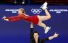 German duo seizes lead in Olympic pairs on error-filled night