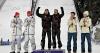 Austria finally finds footing, soars to first Olympic men's super team large hill ski jumping title
