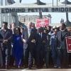 Jesse Jackson (2nd L), Coretta Scott King (3rd L), then US president Bill Clinton (4th L) and congressman John Lewis (5th L) walk over the Edmund Pettus Bridge in 2000 in Selma, Alabama to mark the 35th anniversary of the 1965 Voting Rights March