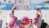U.S. skier protests women's exclusion from Olympic sport while cheering for brother at Milan Cortina