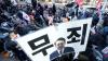 South Korean court sentences president to life in prison