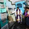 Roman Catholic priest Father Flavie Villanueva blesses the tomb of Edward Sentorias who died during former Philippine president Rodrigo Duterte's war on drugs, at a cemetery in Manila on February 16, 2026