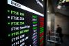 FTSE 100 climbs on strong retail sales data