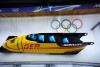 Germany’s Johannes Lochner storms to a big early lead in Olympic four-man bobsled